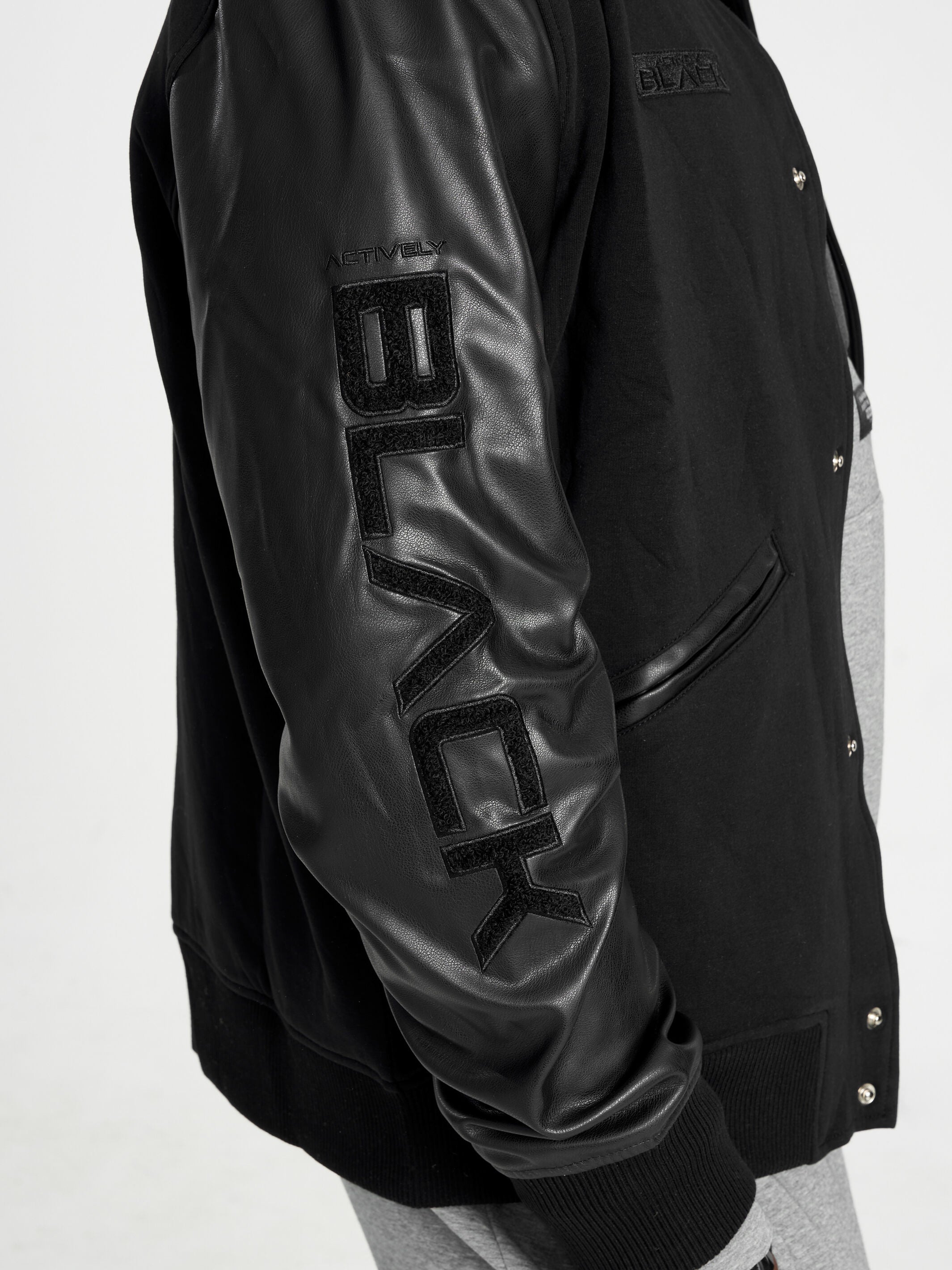 Unisex Black Fist Varsity Jacket